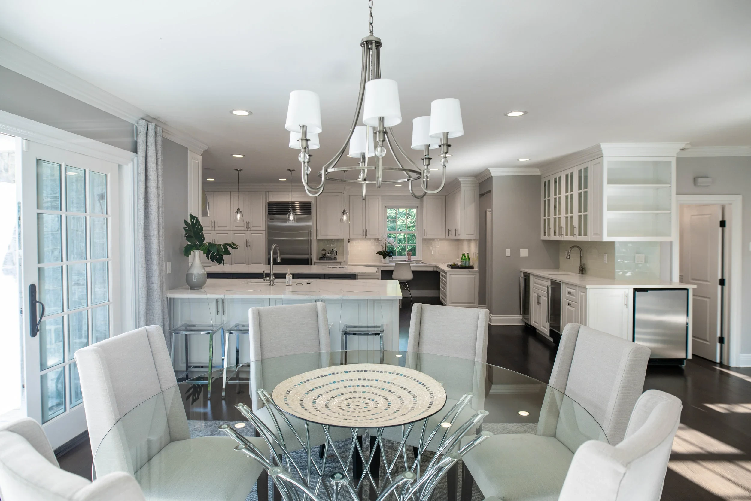 Luxury living room by Ariston Construction
